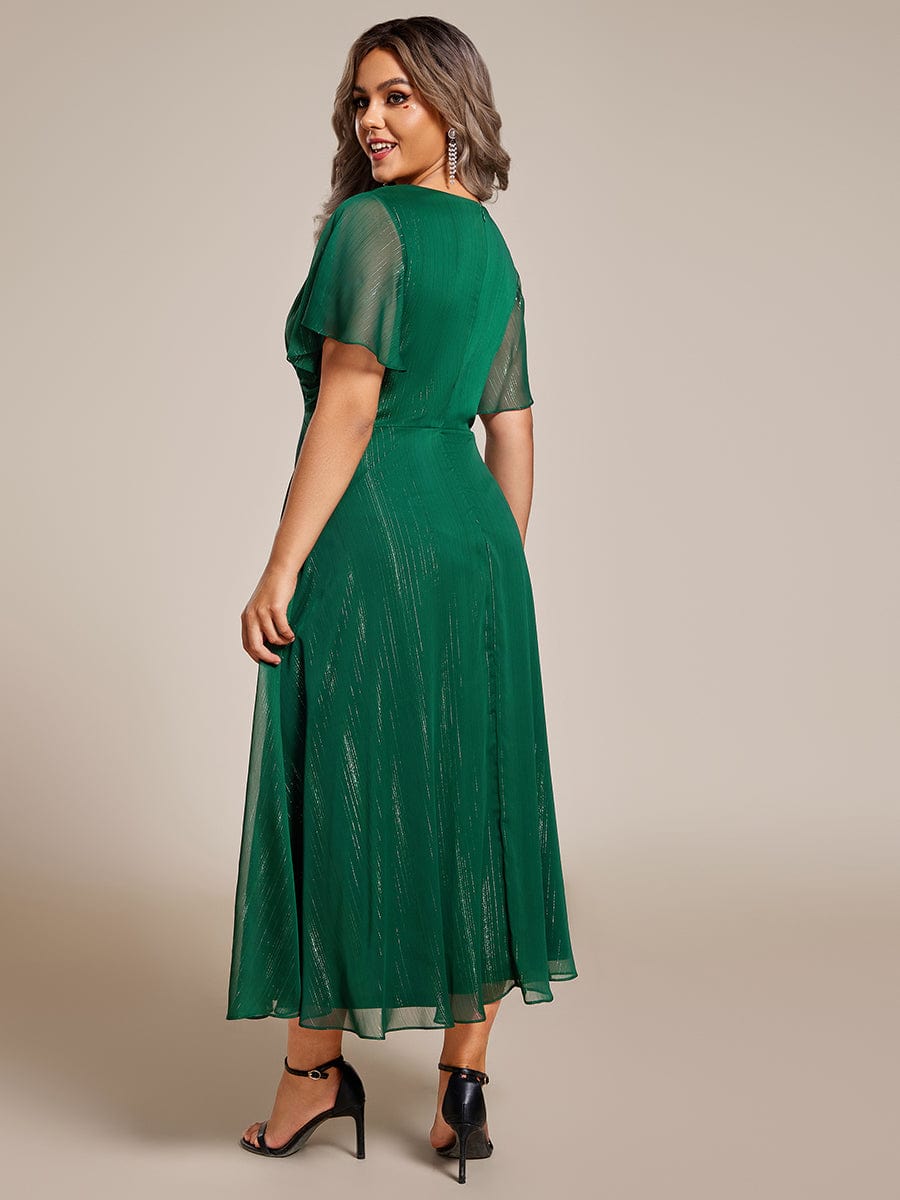 Plus Size Silver Metallic Fabric V-Neck A-Line Dress featuring Delicate Ruffled Hem #color_Dark Green