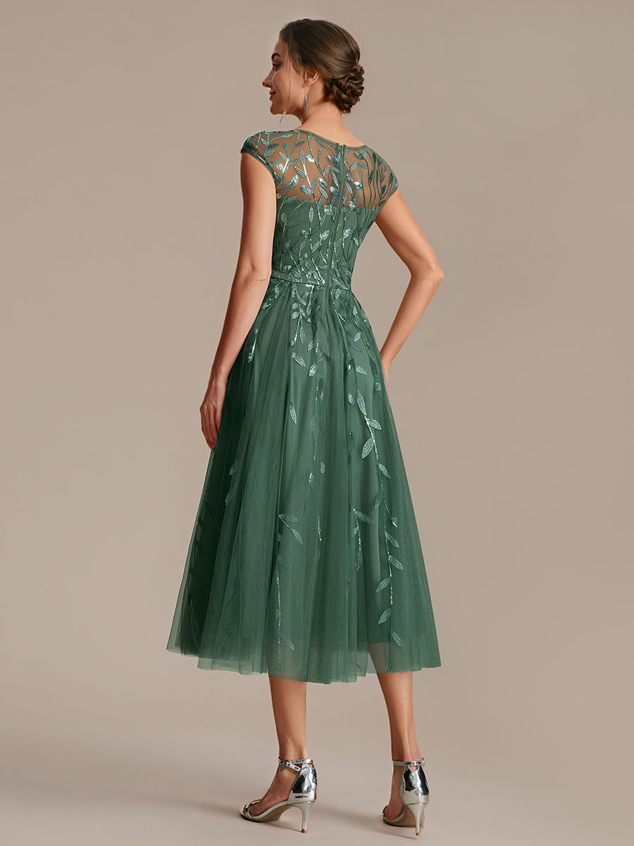 See-through Sequin Cap Sleeve Wedding Guest Dress #color_Eucalyptus
