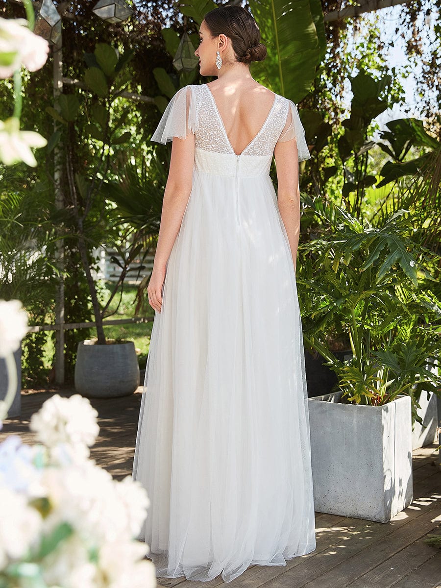 Sequin Sweetheart Sheer Flutter Sleeve Tulle Empire Waist Bump Friendly Dress #Color_White Sequin Sweetheart Sheer Flutter Sleeve Tulle Empire Waist Maternity Dress