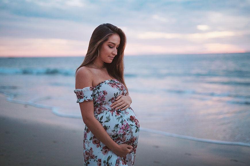 a-woman-standing-by-the-sea