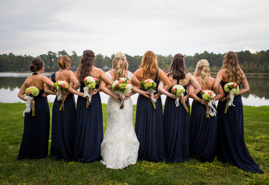 bride-with-bridesmaids-in-navy-blue-dresses