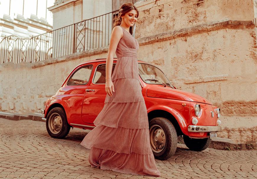 larisa-walked-pass-a-red-car