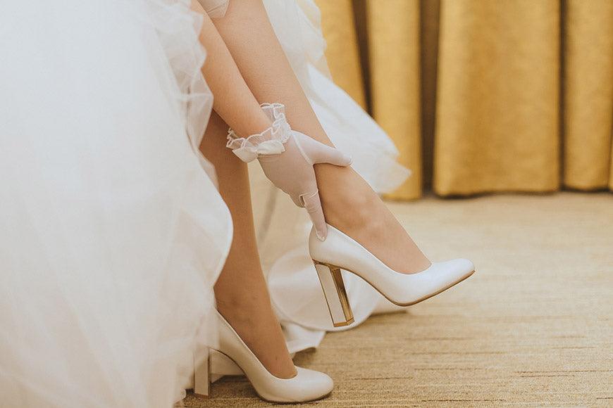 White-high-heeled-shoes