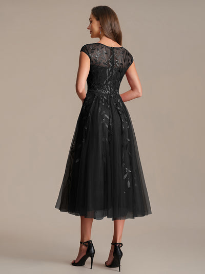 See-through Sequin Cap Sleeve Wedding Guest Dress #color_Black