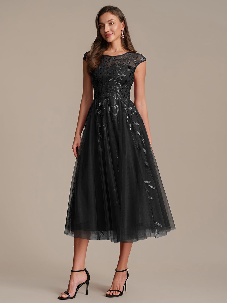 See-through Sequin Cap Sleeve Wedding Guest Dress #color_Black