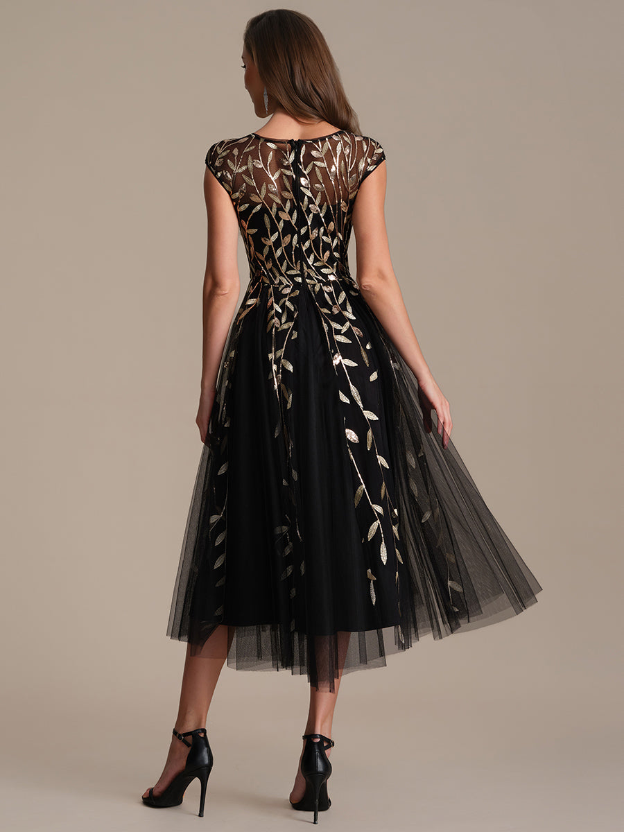 See-through Sequin Cap Sleeve Wedding Guest Dress #color_Black & Gold