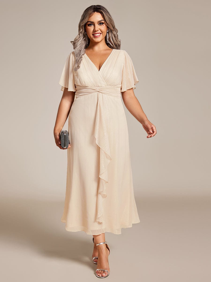 Plus Size Silver Metallic Fabric V-Neck A-Line Dress featuring Delicate Ruffled Hem #color_Champagne