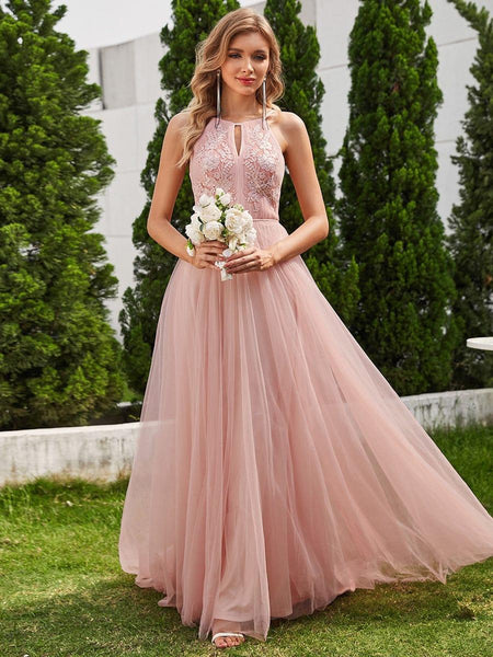 Halter Neck Applique Tulle Wedding Dress adorned with A-Line