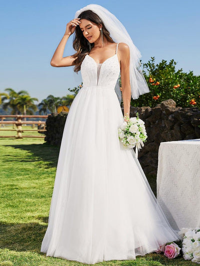 V-Neck A-Line Wedding Dress featuring Delicate Pearl Accents #color_White